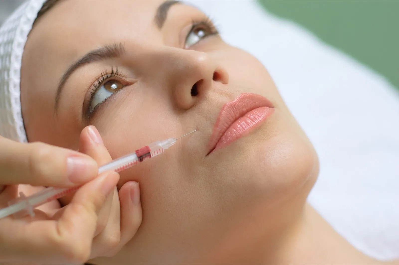 Botox injection being administered